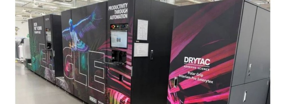 Ricoh used Drytac’s Polar Grip film and Interlam Emerytex Pro laminate to create eye-catching wraps for two printing machines at its European Customer Experience Centre.