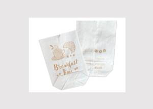 Paper cross-bottom bags are printed with bio-based ink colored by a coffee-roasting side stream.