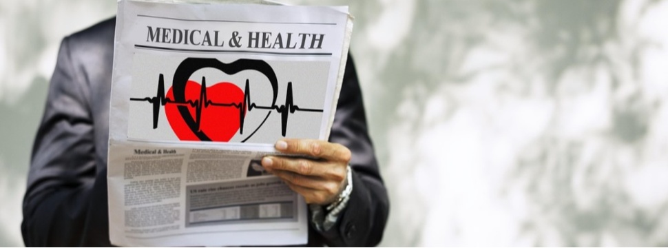 Man reads a newspaper