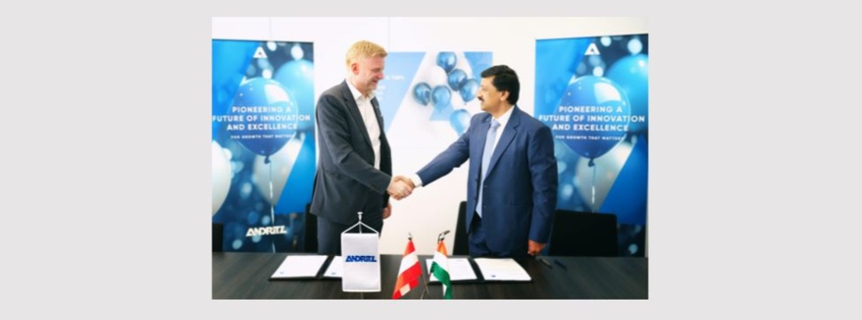 Gerald Steiner, Senior Vice President of ANDRITZ Paper & Tissue, and Dr. Sandeep Saxena, Chairman & Managing Director of Tamil Nadu Newsprint & Papers Ltd. Two men are shaking hands.