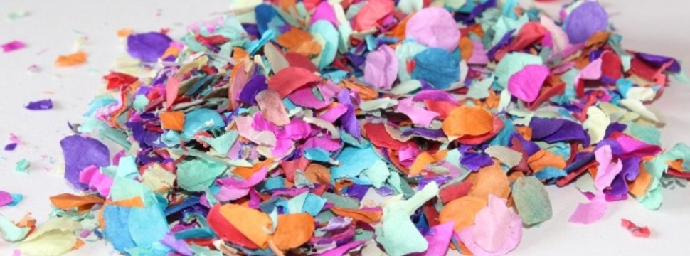 Confetti is produced in the paper industry as a waste product from the perforation of continuous paper
