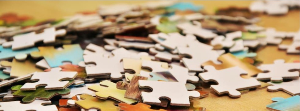 Jigsaw puzzles made of cardboard are a popular pastime for young and old.