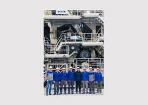 Voith team in front of the new DuoCentri NipcoFlex press with center belt