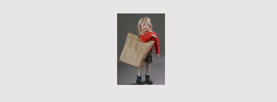 Girl with paper carrier bag