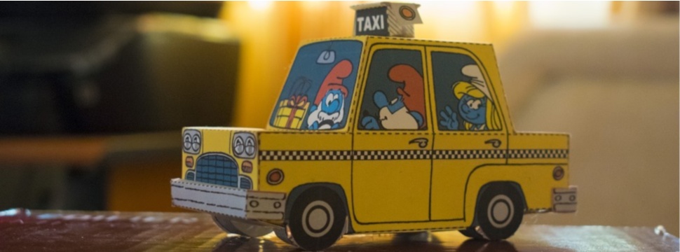 Much earlier, the Smurfs already drove in a cardboard car.