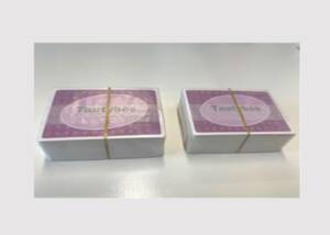 Fossilfreies, heißsiegelbares, transparentes Papier als Verpackung für Kartenspiele.