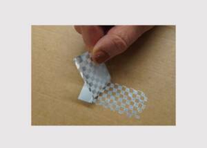 HERMA has now introduced HERMAvoid checkerboard (type 935), a tamper-proof self-adhesive material specially designed for challenging applications on rough (transport) cardboard