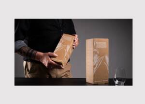 White digital printing on brown paper supports premium presentation for Riedel Glas