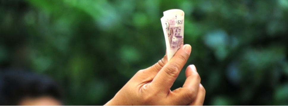 Hand with paper money Hand with paper money