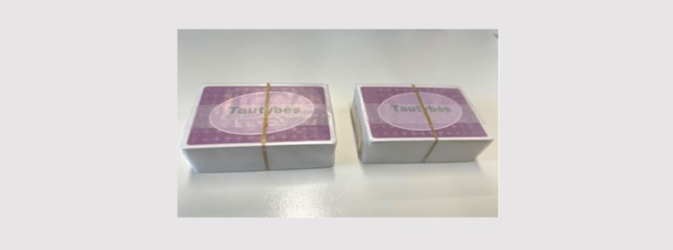 Fossil-free, heat-sealable transparent paper solution for board game packaging