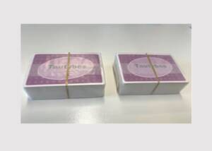 Fossil-free, heat-sealable transparent paper solution for board game packaging